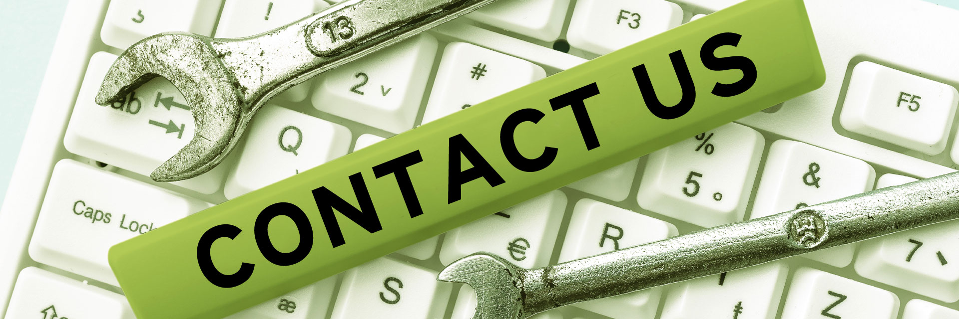 wrenches on keyboard & words contact us