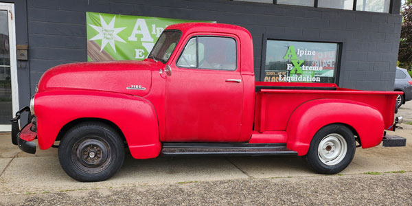 old red chevy 3100 pickup outside butch's