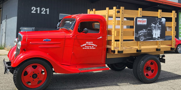 old red flatbed truck outside Butch's